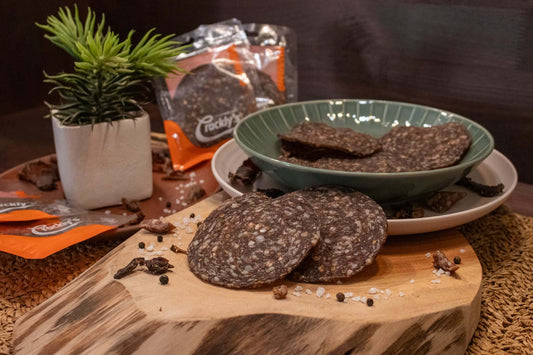 Crackly's Biltong Wheel 17g (30 pack) - Our Plain Wheel offers a powerful flavour, with a balanced acidity. It marinades for 2 days, packed with traditional goodness for you to binge on!